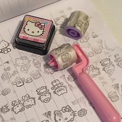 DIY印鑑は印泥かわいい少女心kitty造形ローラー式印鑑を持っていて、親友にプレゼントします