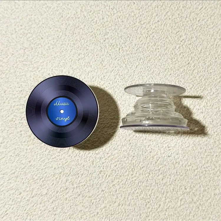 Grabación de CD vinilo redondo airbag soporte adhesivo tipo teléfono móvil adhesivo 360 ° giratorio telescópico succión magnética de corriente de marea