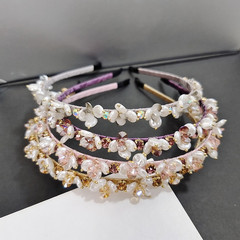 New trendy flower hair clip imitating pearls and water cutouts, women's ultra-ethereal temperament hairpin for outdoor bangs and hair accessories