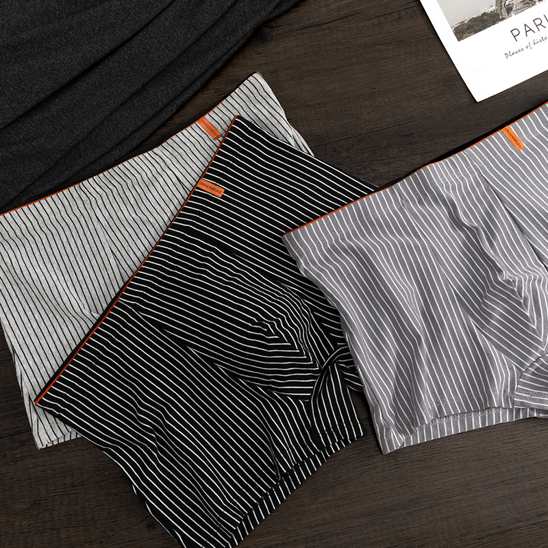 Pantalones interiores de hombre algodón antibacteriano Xinjiang pantalones planos juveniles vitalidad pantalones cortos a rayas verticales al por mayor