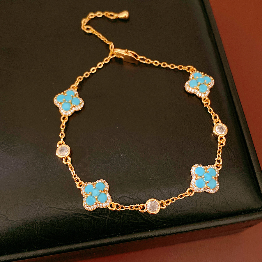 Pulsera - oro - Azul - cuatro flores (chapado en oro real)