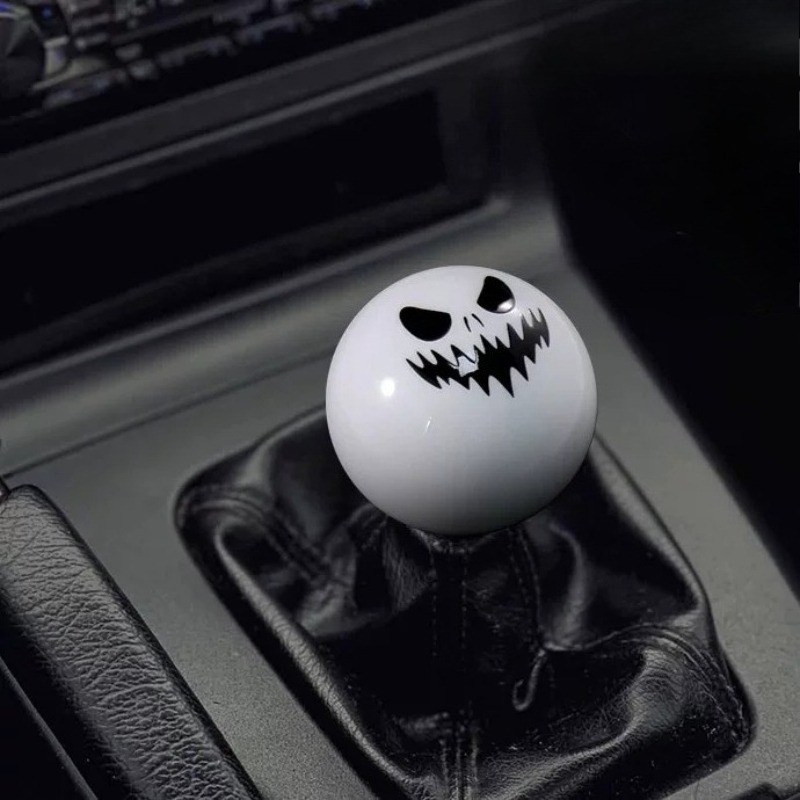 Car modification gear shift knob, manual transmission, round black and white ghost face design, resin gear stick head, universal shift lever