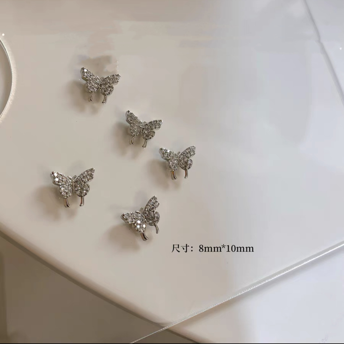 Celebridad de Internet nuevos accesorios de uñas Iris arco de alta retención de color ajuste arco de uñas diamante desgaste material de uñas diamante