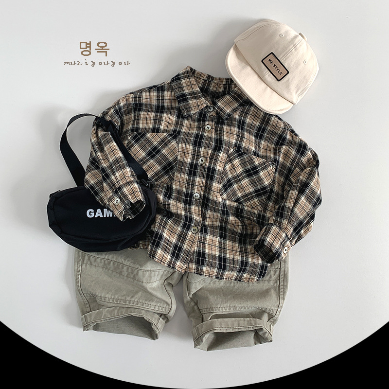 Camisas a cuadros para niños y niñas 2025 nuevos niños sueltos y casuales chaquetas de personalidad coreana tops ropa para niños de moda al por mayor