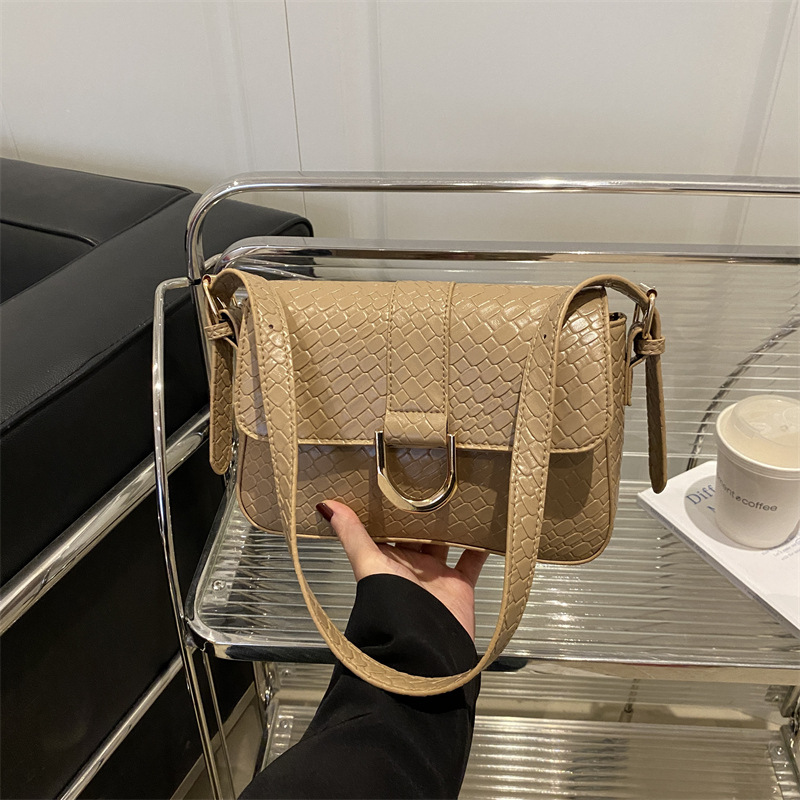 Bolsa de brazo de mujer trenzada retro 2025 primavera nueva bolsa de brazo en el temperamento bolso pequeño bolso cuadrado bolso mujer