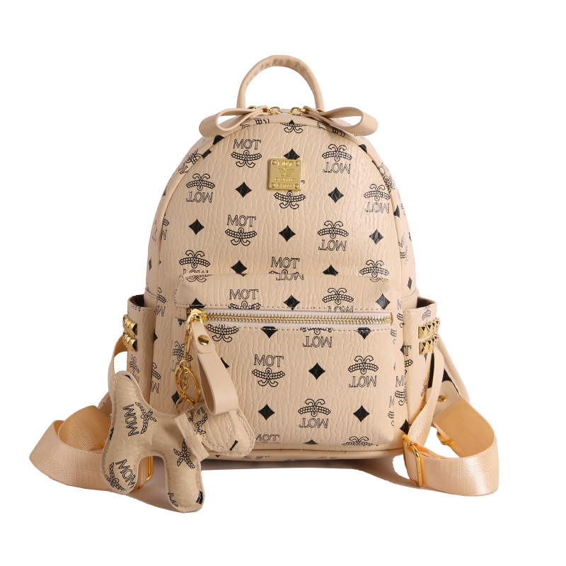 Mochila de moda coreana impresa para mujeres, mochila de clase para estudiantes universitarios, adornos colgantes, mochila de viaje de gran capacidad para mujeres