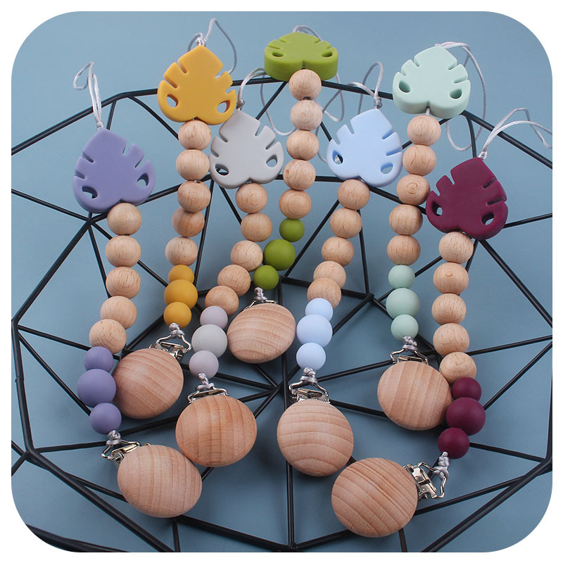 Suministros para bebés creativo haya chupete clip molar juguete mordedor bebé hoja de silicona chupete cadena anti-caída de la cadena