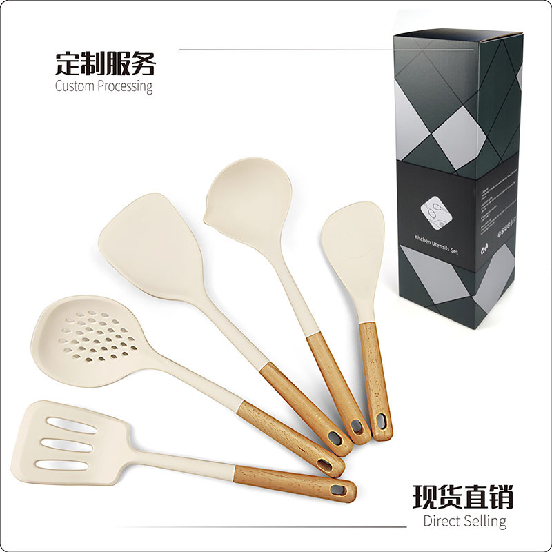Nuevo mango de madera utensilios de cocina de silicona transfronterizo dedicado 12 piezas de alta temperatura resistente antiadherente sopa cuchara colador pala traje