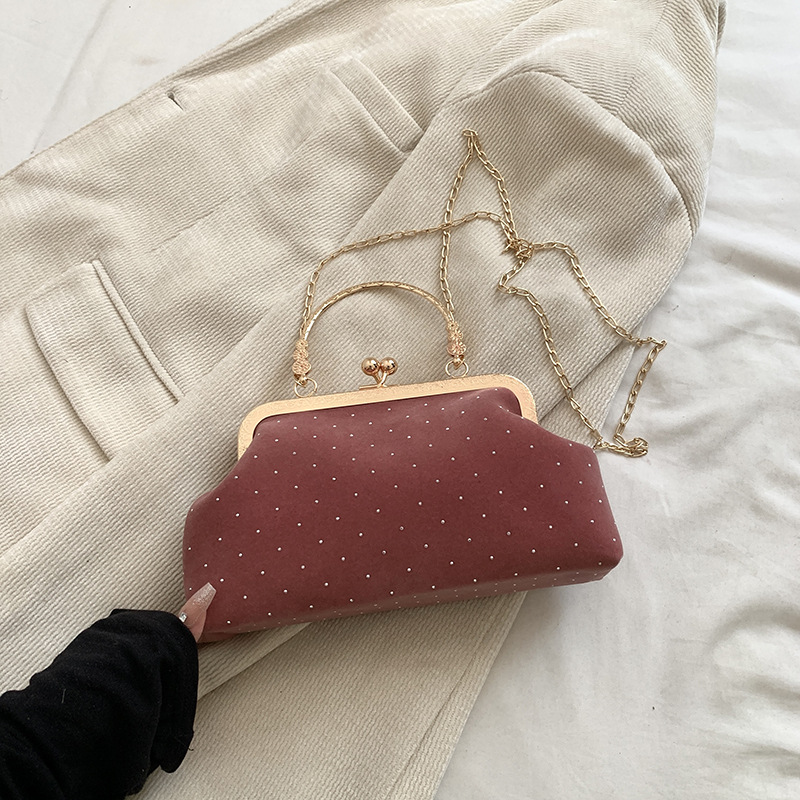 Alta textura retro bolso de mano mujer otoño 2024 nueva moda versátil remaches bolso de hombro cadena mochila