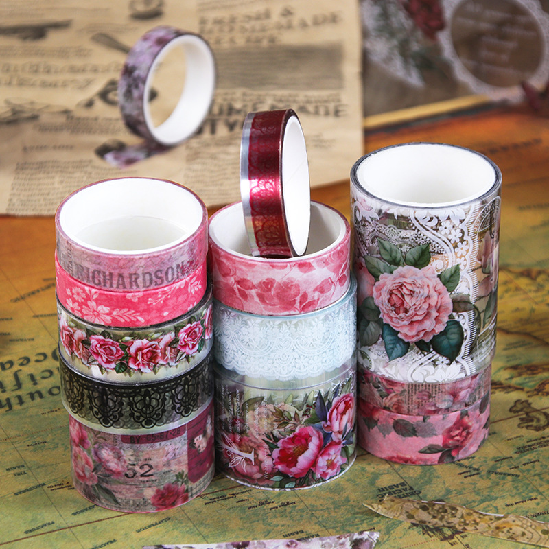 Explosiones transfronterizas de 12 rollos retro y papel conjunto de cinta adhesiva decoración DIY pegatinas de cuentas de mano decoración pegatinas de material de base