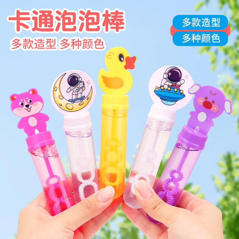 Mini barra de burbujas para niños sosteniendo un pequeño pato amarillo máquina de burbujas dispositivo de burbujas niños y niñas puestos callejeros juguetes al por mayor