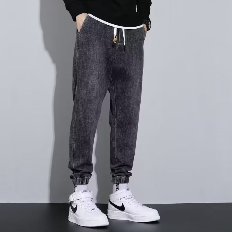 2024 primavera y otoño pantalones vaqueros de cintura elástica todo fósforo para hombres, pantalones de pierna ancha rectos sueltos para adolescentes de la calle principal