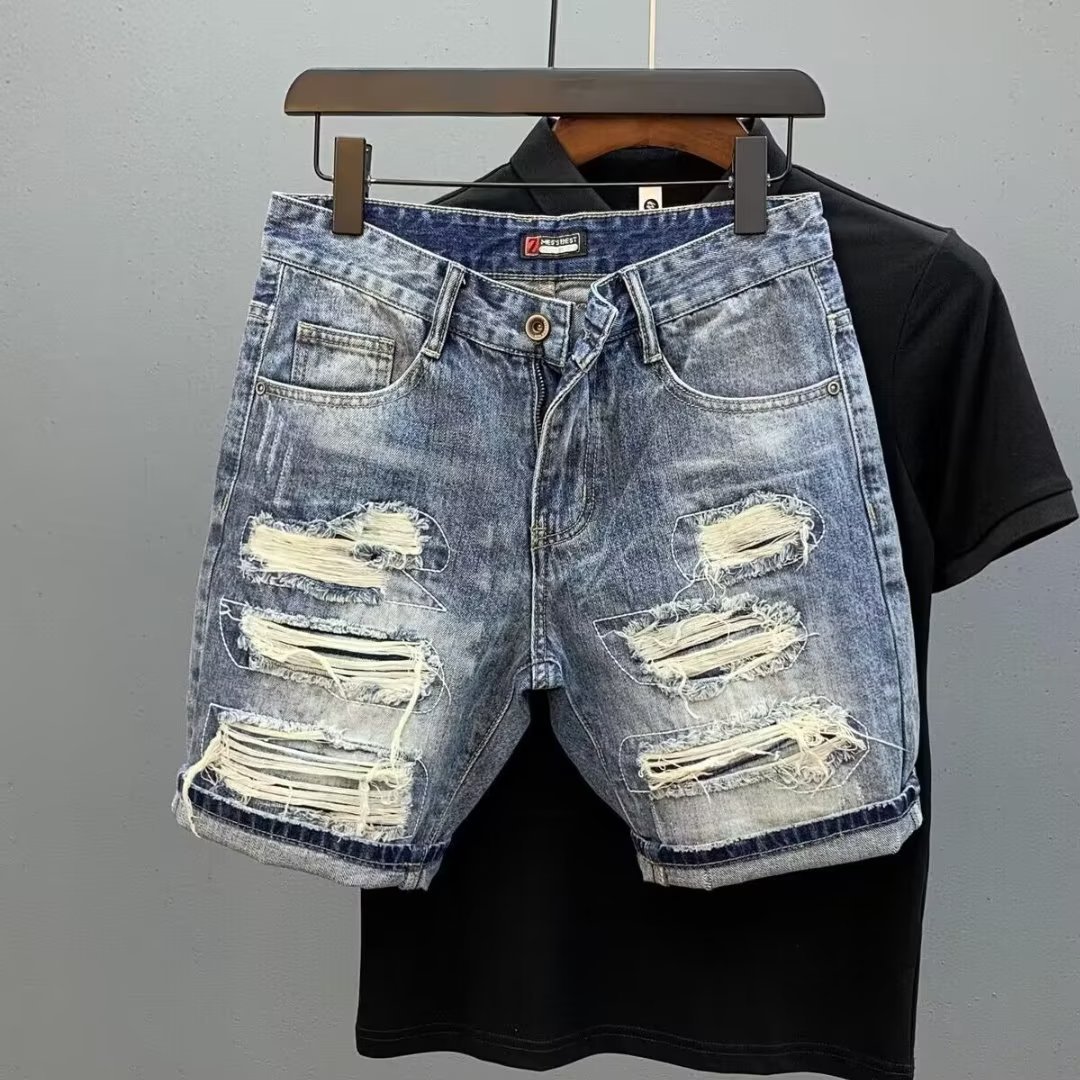 Trendy men's denim shorts with side whisker detailing, new summer 2026 style, ripped and distressed, 5-inch length.