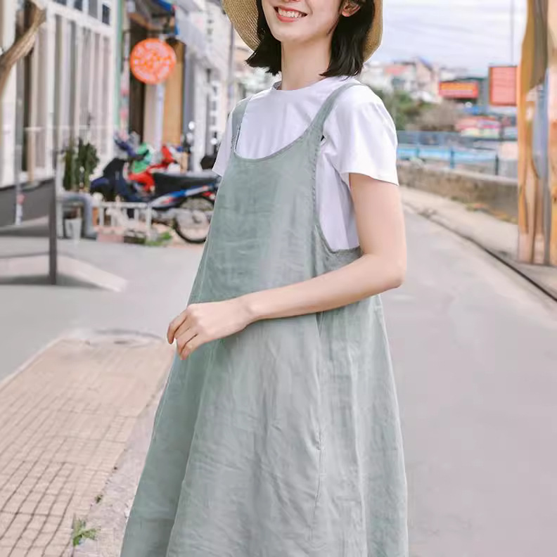 気質清新背中風景減齢亜麻黒ワンピース女2024夏新作女装ストラップスカート