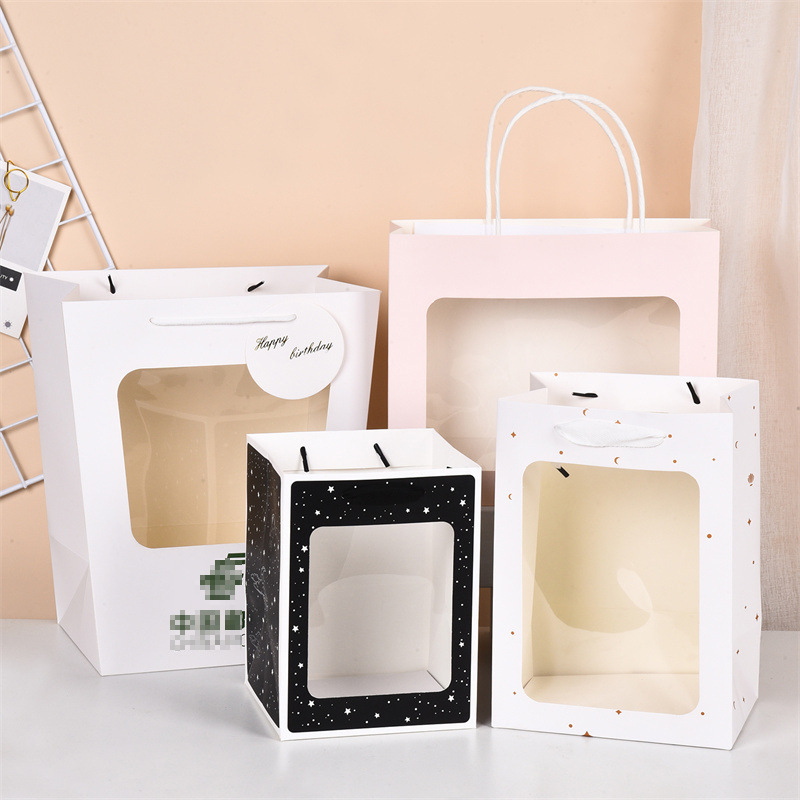 Fabricantes de Tarjeta blanca bolsa de regalo de la ventana bolsa de regalo personalizado papel embalaje bolsa impresión logo venta al por mayor