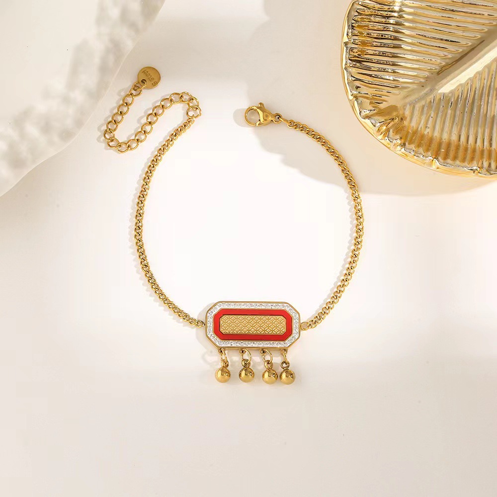 Pulsera de trébol de acero titanium vendedora caliente transfronteriza europea y americana con incrustaciones de concha pulsera colgante pulsera de diseño avanzado sin desvanecimiento al por mayor