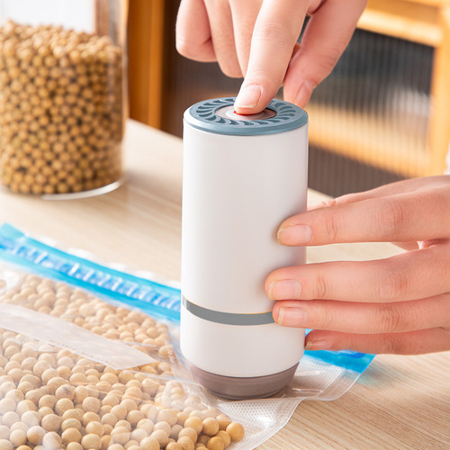 Small handheld electric air pump fully automatic vacuum packaging machine mini household mini fresh-keeping machine pumps compression bags