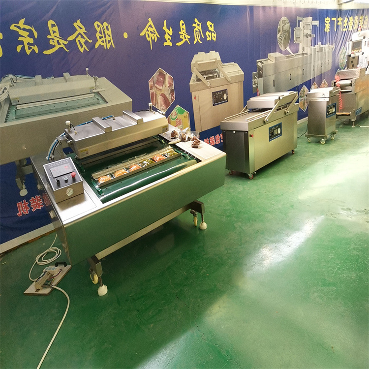 1100连续滚动式真空包装机全自动连续式鸭蛋真空封口机设备供应