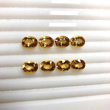 工廠直銷天然黃水晶戒面巴西黃晶橢圓形裸石刻面彩寶配石戒指耳環