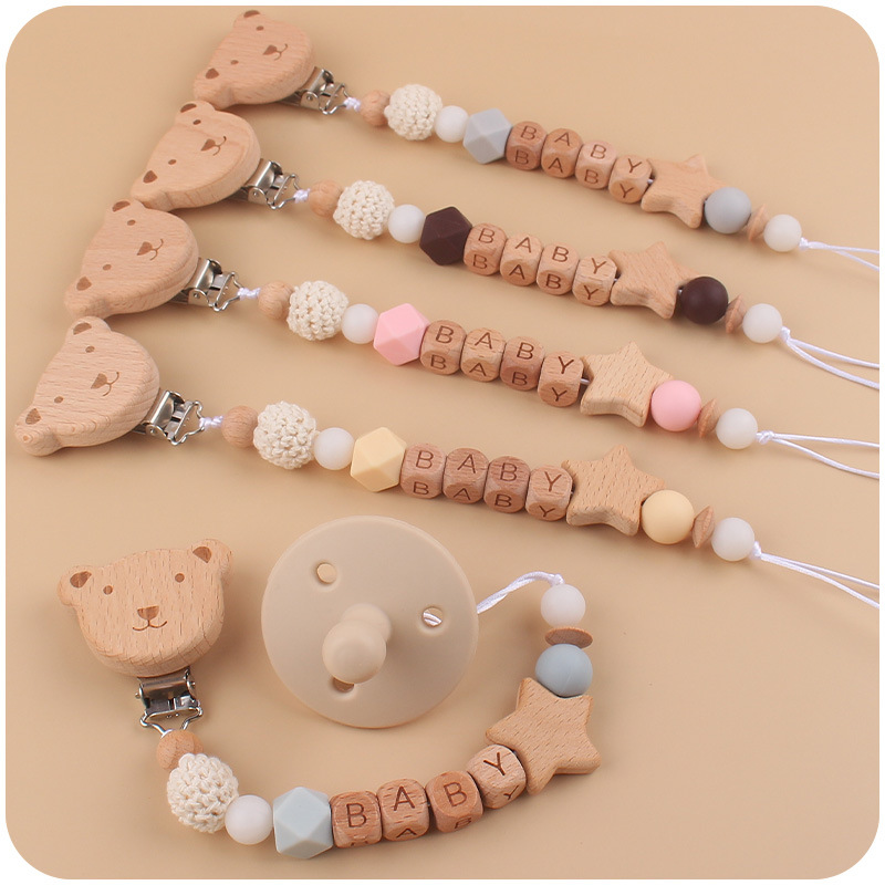 Nuevo bebé Beech dibujos animados oso chupete cadena calmante bebé chupete de silicona a prueba de mordedura cuerda de dos piezas