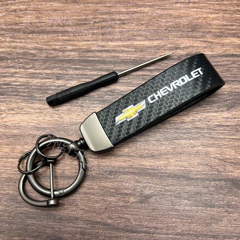 ハイエンドの炭素繊維の革のキーホルダーの車のロゴの広告のキーホルダーのビジネスの自動車のキーホルダーのペンダントの卸売り|undefined