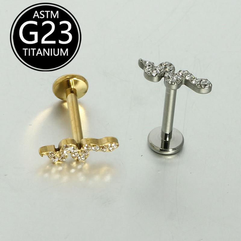 Silver pointed spike labret stud material detail