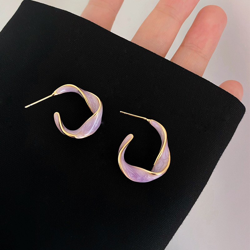fashionable trend earrings with pigtail