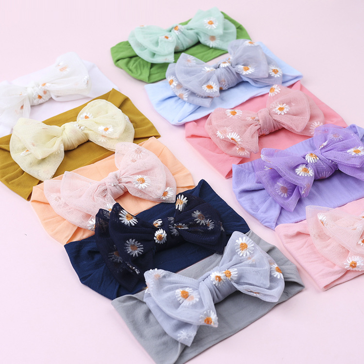 Simple Solid Color Double Bow Children Small Daisy Flower Nylon Headband display picture 3