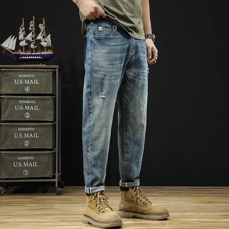 Herr vår/sommar ny produkt Big Bull Wind perforerade jeans lösa, lätta, andningsbara 9/4 fotbyxor_voghion.com