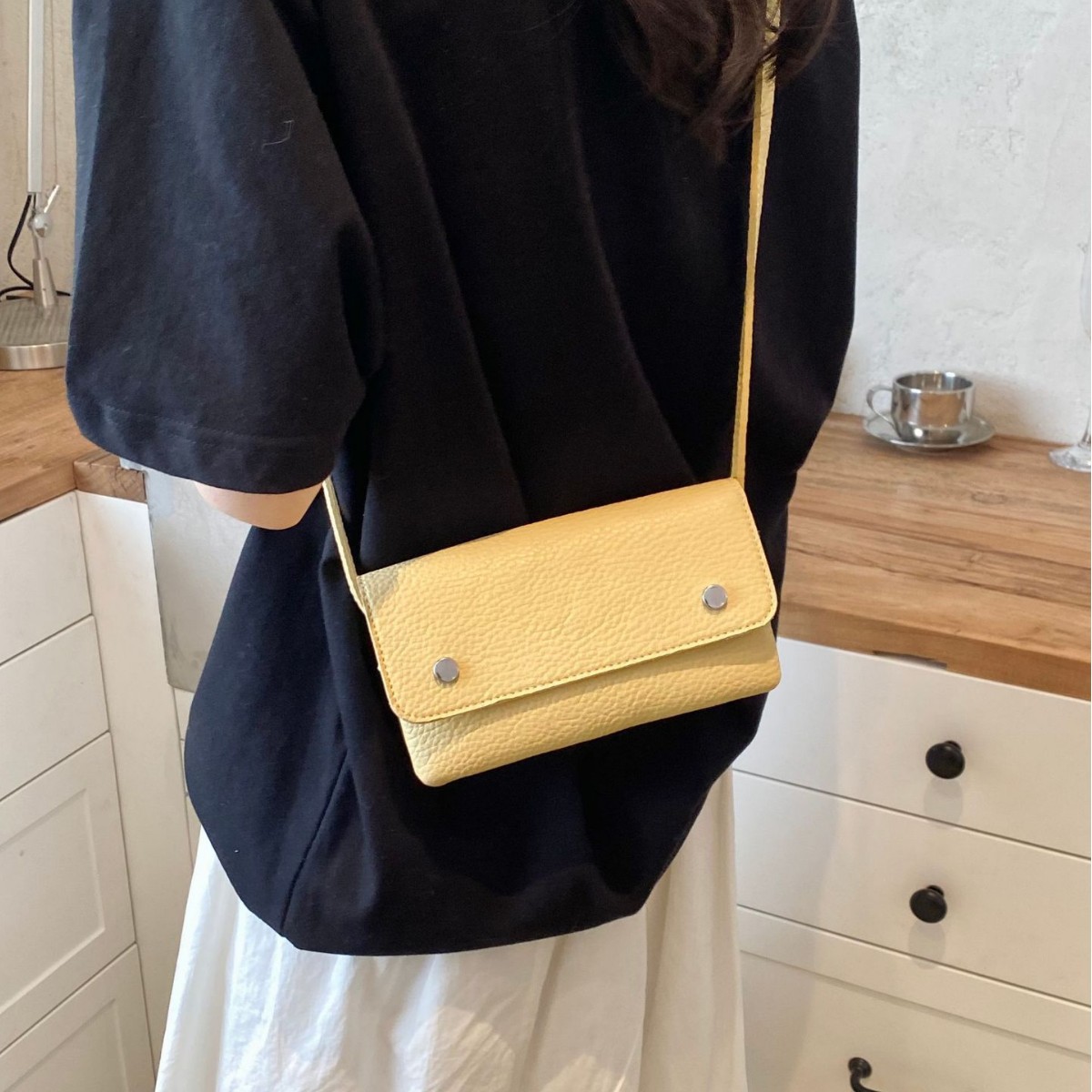 Nicho coreano de transporte universal bolso pequeño para mujeres verano 2026 nuevo multicapa sensación diaria de hombro mochila