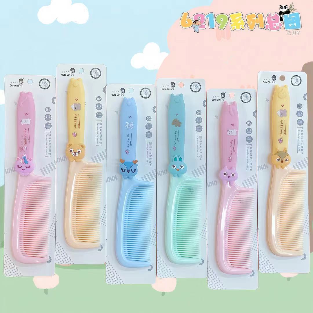 6219圆柄贴片软胶梳