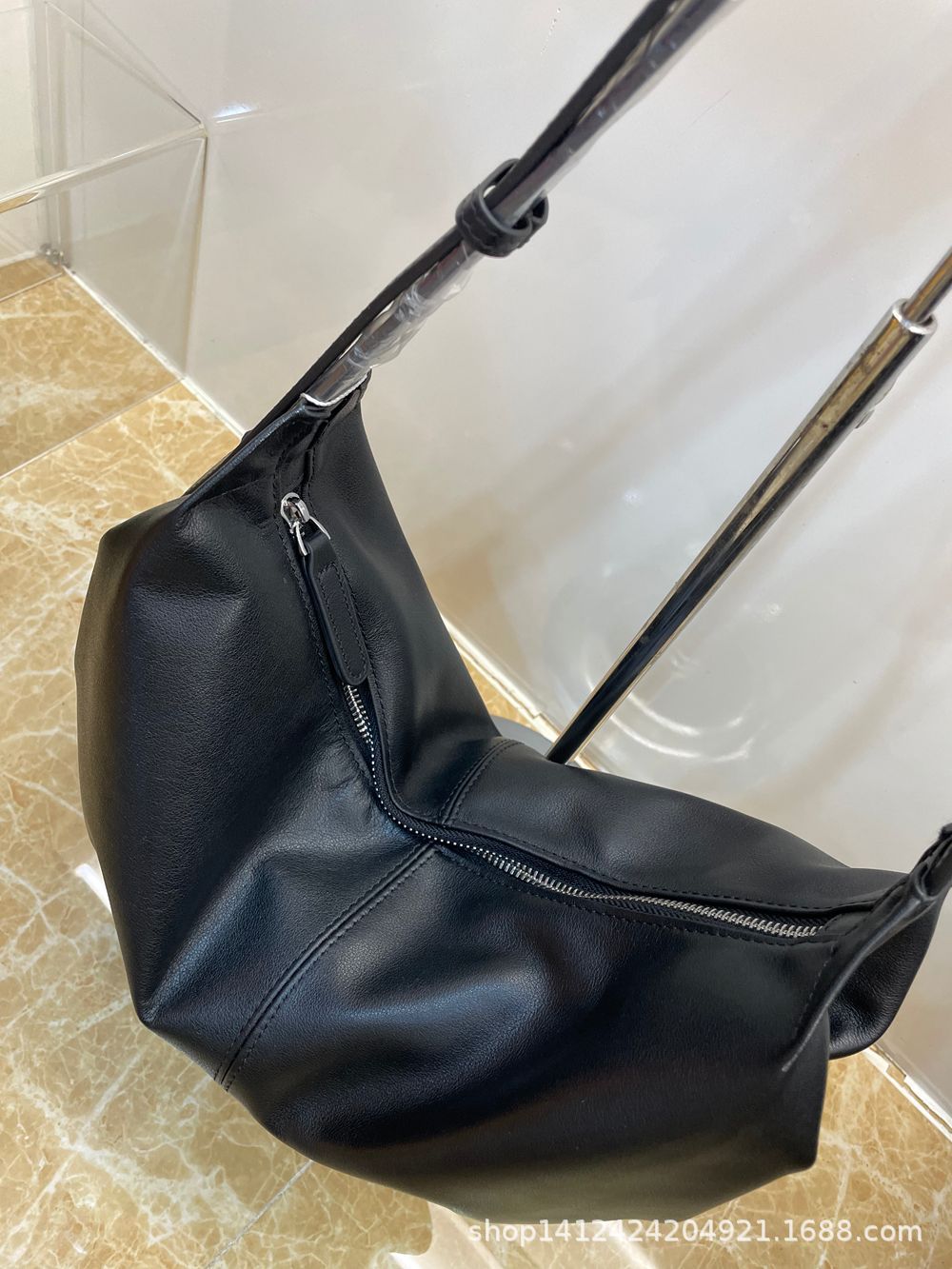 Nuevo bolso de albóndigas de piel blanda de moda de gran capacidad diseño de nicho casual retro bolso plegable de cuero de hombro único mujer