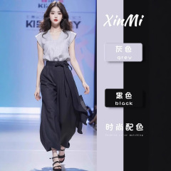 夏服とセットのナシの形の体つきの茶系は着て優しくして街のおしゃれな洋風のギャルのスーツのスカートのズボンを結びます。