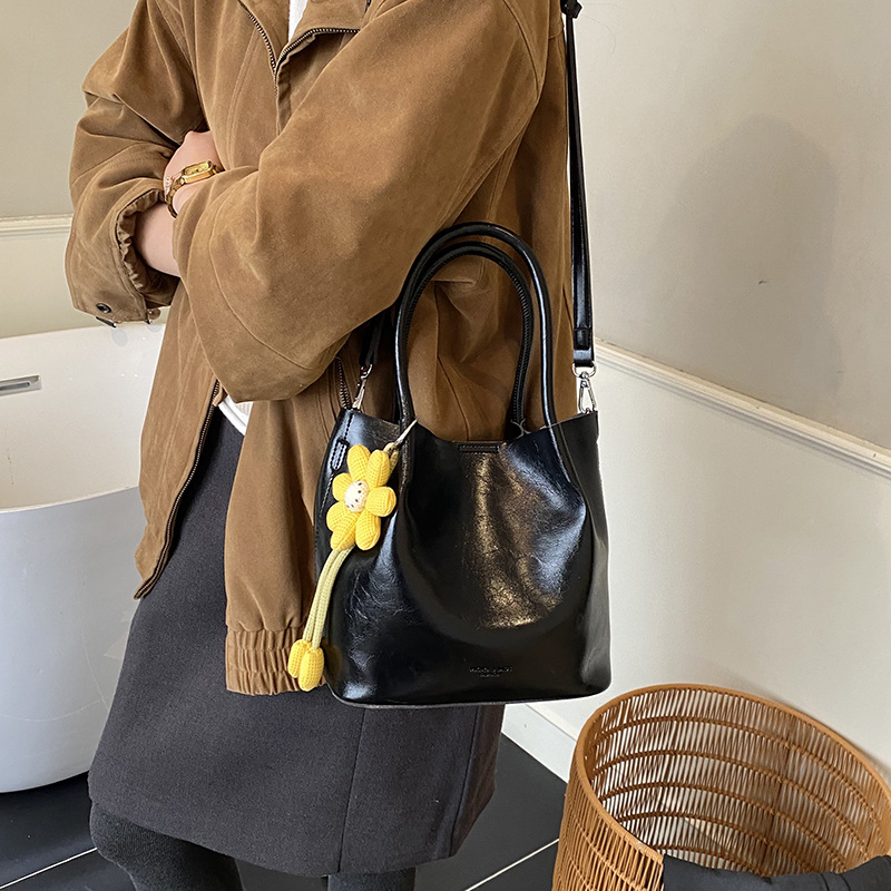 Nicho Zhong canasta de verduras de alto nivel, bolso de cubo, mujer 2025 nuevo retro bolso de trabajo, mochila de viaje