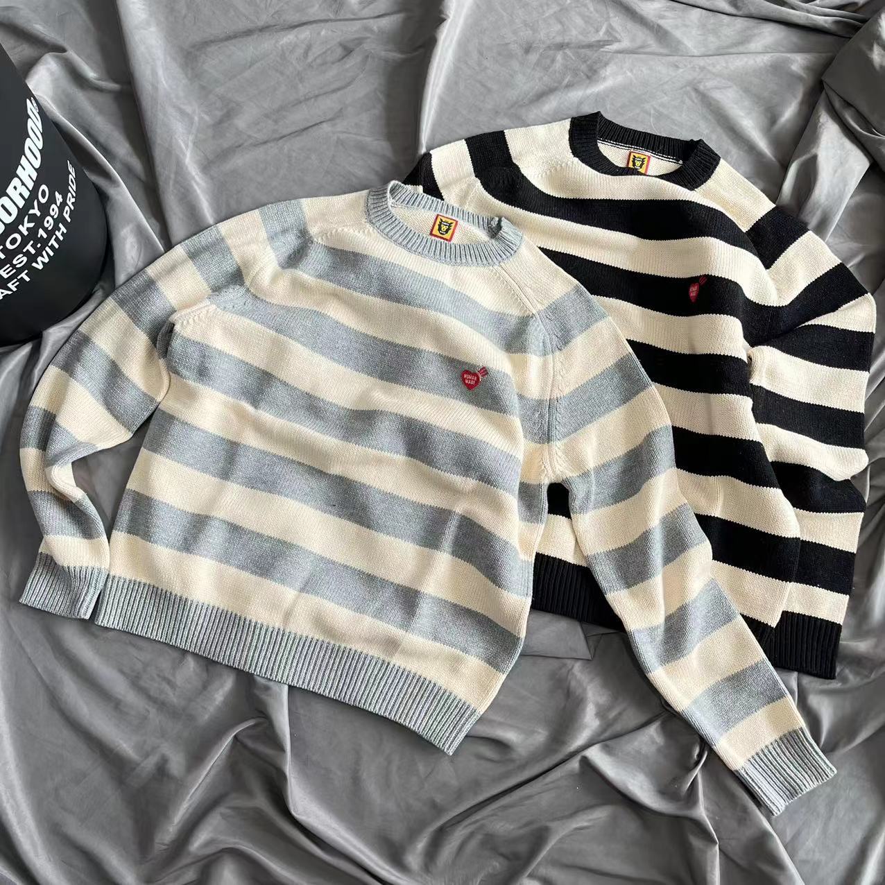 A Japanese trendy human made striped swe...