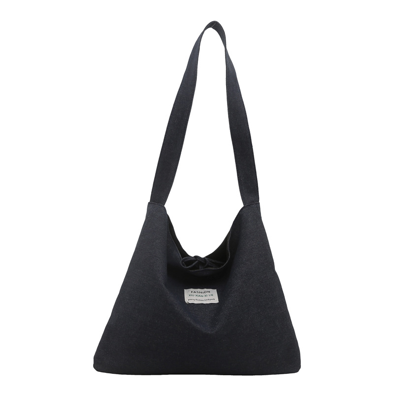 2025 primavera y verano estilo nacional denim tendencia nueva mochila de hombro de gran capacidad mochila de pulsación de la moda