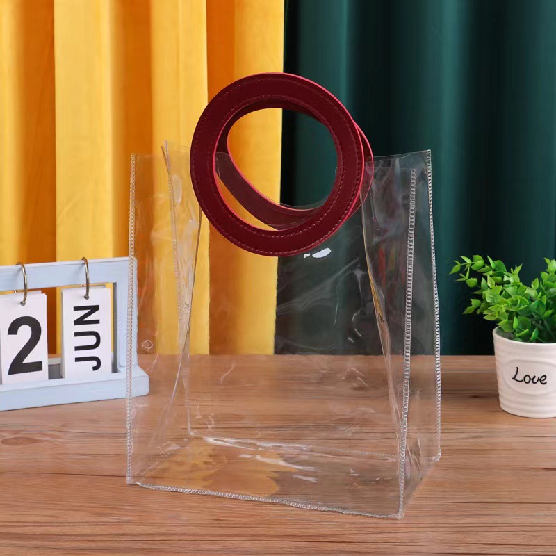 Navidad mano bolsa de regalo de la boda regreso dama de honor bebé luna llena caja de dulces de pvc transparente regalo de la mano