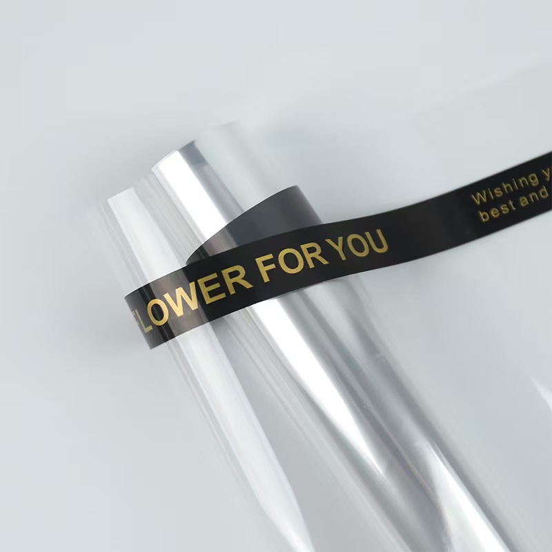 Celofán a prueba de polvo al por mayor opp forro de plástico de papel de embalaje de flores paquete de ramo celofán transparente en stock