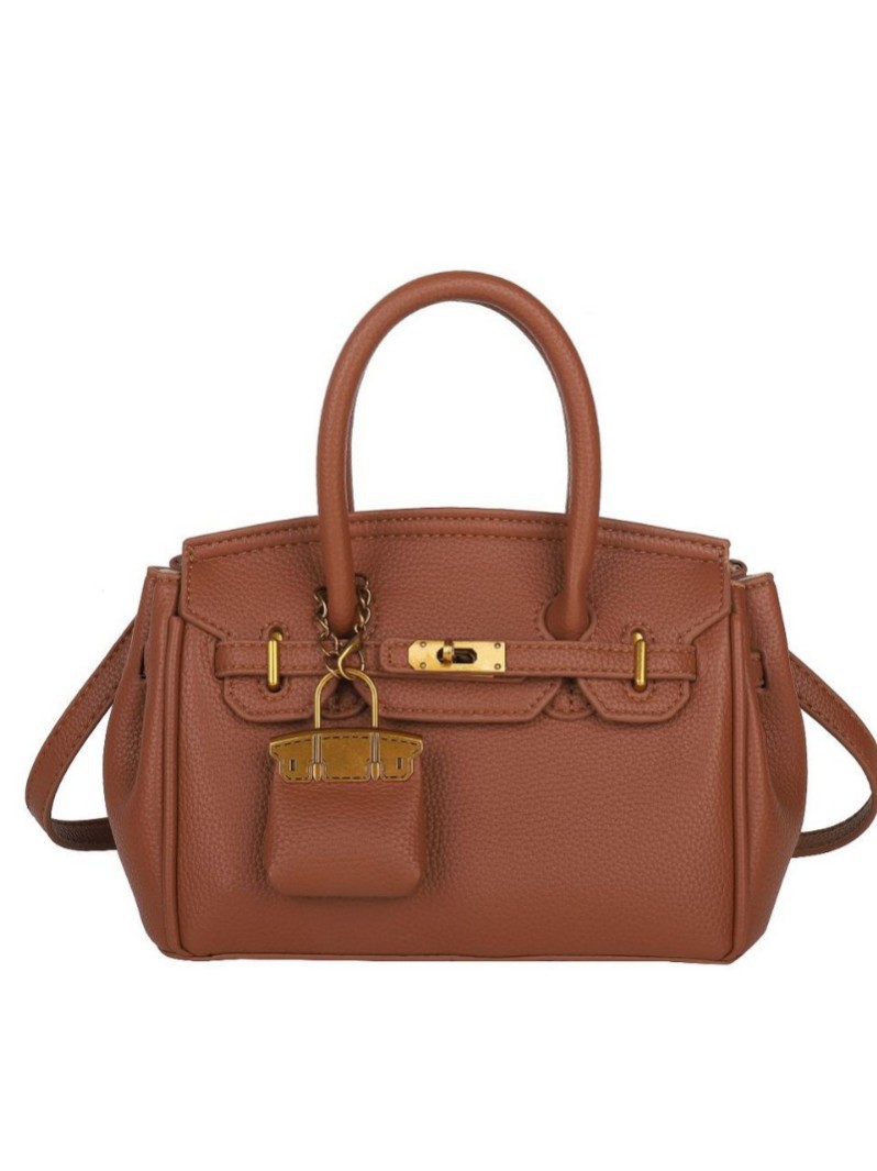 Bolso Kelly de moda coreana para mujer, nuevo modelo transfronterizo de gran venta con textura de alta calidad y diseño de lichi, bolso de hombro y bandolera.