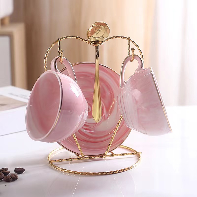 Luz de lujo taza de café traje de estilo europeo de alta apariencia taza y platillo taza de café de cerámica de alta gama exquisito juego de té de la tarde británica