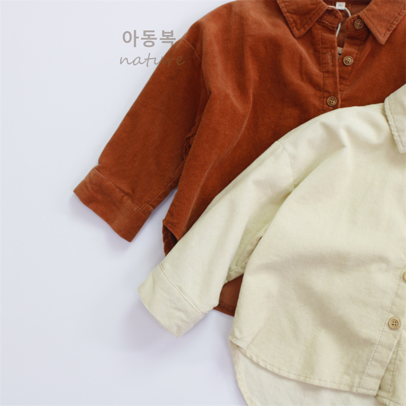 Camisas infantiles de primavera 2025, categoría A, camisas para niños estilo coreano, versátiles, con cuello vuelto, de pana, blusas para niñas, al por mayor.