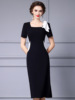 Black and white color block square collar exposed collarbone acetic acid wrapped hip skirt 2024 summer