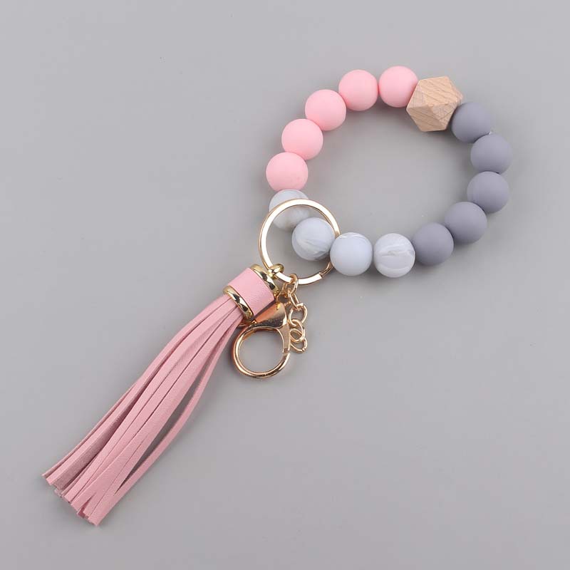 Nuevo cuero creativo pu borla colgante silicona muñeca llavero colgante silicona cuentas pulsera llavero
