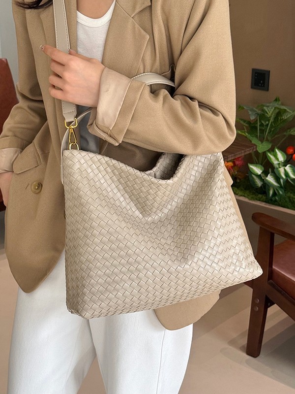 Bolsa para mujeres 2026 comercio exterior nueva textura de alta calidad tejida versátil bolso de mano de gran capacidad de lujo ligero bolso de viaje