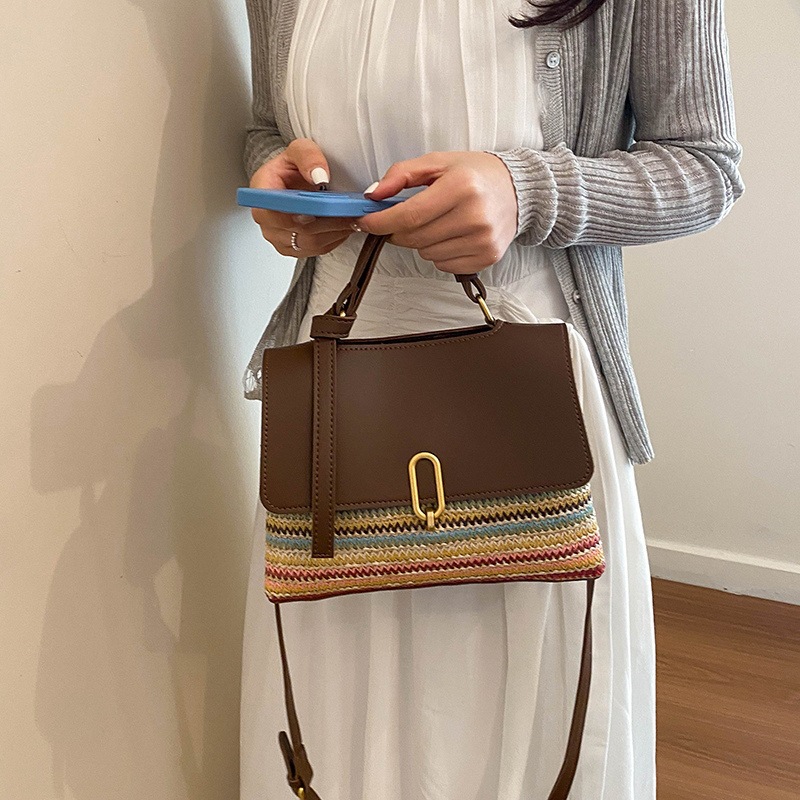 Bolso de paja de verano para mujeres 2026 nuevo estilo de moda bolso de hombro de mano sensación diaria lujoso ligero versátil mochila