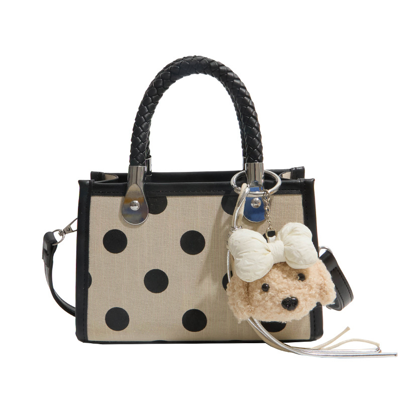 Corea del Sur Xiaozhong wave punto bolso de mano simple bolso pequeño para mujeres 2026 nueva moda versátil viaje mochila de hombro