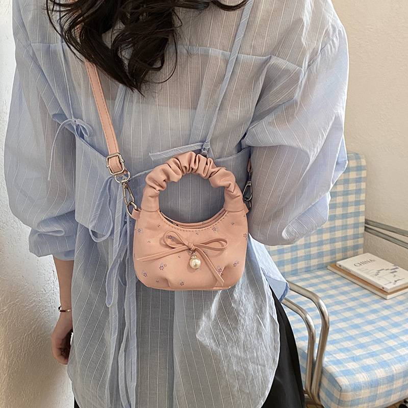 Nuevo bolso para niños dulce pequeña flor fresca bolso de hombro de niñas lindas bolsas de mano de arco plegado bebé