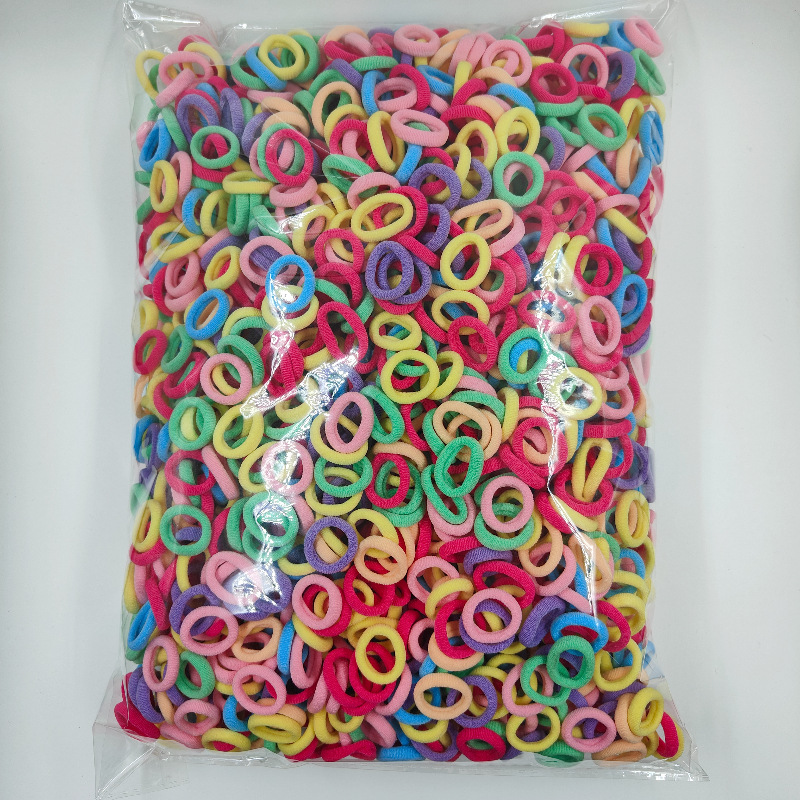 Fábrica directa sin costuras de alta elasticidad cuerda de cabeza para niños anillo de toallas OPP2000 anillo de cabello de cabello para bebés al por mayor