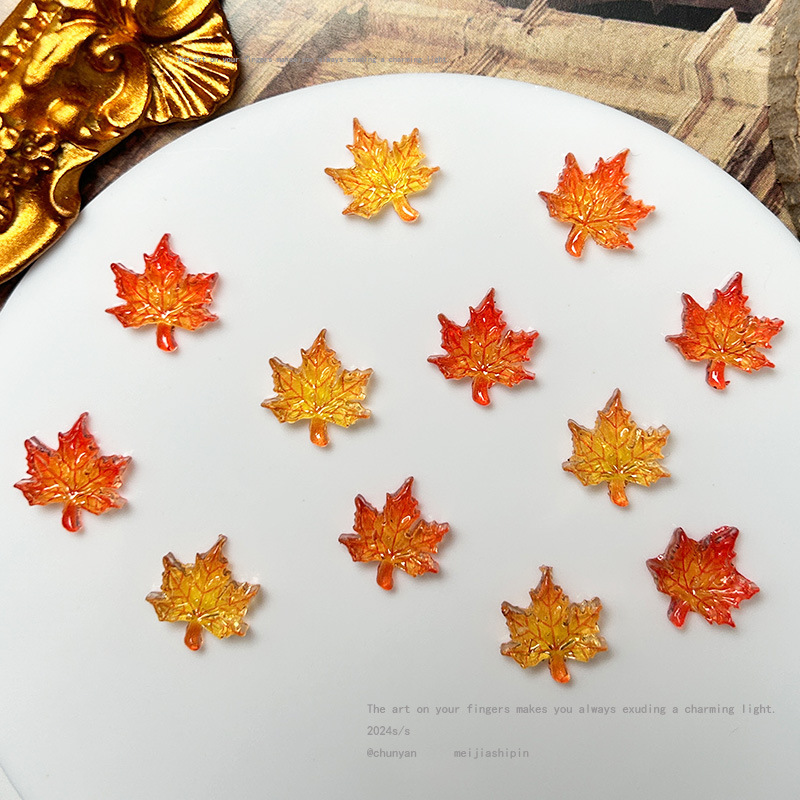 New autumn and winter printing and dyeing Maple Leaf nail jewelry atmosphere sense three-dimensional simulation Maple Leaf nail jewelry resin accessories New autumn and winter printing and dyeing Maple Leaf nail jewelry atmosphere sense three-dimensional simulation Maple Leaf nail jewelry resin accessories