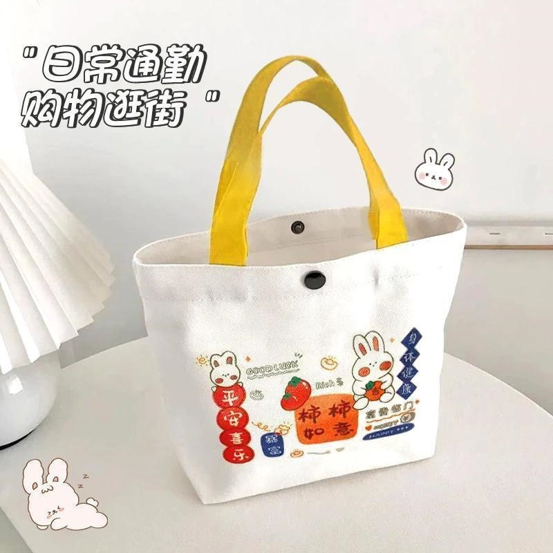 单肩小方包可爱手提袋新款帆布包手拎包便当包时尚休闲柿柿